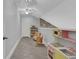 Attic bonus room featuring a miniature toy kitchen at 115 Braided Blanket Blf, Johns Creek, GA 30022