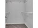 Walk-in closet providing ample storage with wire shelving, perfect for organizing clothes at 115 Braided Blanket Blf, Johns Creek, GA 30022