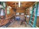 Organized shed interior with work bench, storage shelves, and room for garden and lawn equipment at 115 Braided Blanket Blf, Johns Creek, GA 30022
