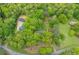 Lush wooded homesite offers privacy and a serene natural setting near a winding road at 1943 Scott Rd, Canton, GA 30115