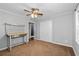 Bedroom with neutral decor, ceiling fan, carpeted floor and a white closet at 1943 Scott Rd, Canton, GA 30115