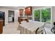 Eat-in kitchen with granite countertops, stainless steel appliances and access to the patio at 1943 Scott Rd, Canton, GA 30115
