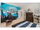 Bedroom featuring a wave mural wall, gaming setup, and comfortable decor at 2005 Etris Manor Dr, Roswell, GA 30075