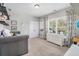 Bright bedroom with a daybed, dresser, and soft neutral color palette at 2005 Etris Manor Dr, Roswell, GA 30075