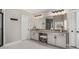 Main bathroom boasts dual sinks, granite counters, a vanity, and separate toilet room at 2005 Etris Manor Dr, Roswell, GA 30075