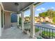 View from a covered front porch with columns and a view of the neighborhood at 2582 Corey Park Dr, Loganville, GA 30052