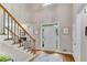 Inviting foyer featuring a wood floor, and staircase at 3110 Royal Troon, Woodstock, GA 30189