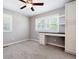 Bright bedroom with a built-in desk and storage, perfect for a home office or study area at 4284 Carlos Ct, Powder Springs, GA 30127