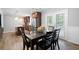 Bright dining area seamlessly integrates with an open-plan kitchen, enhancing the home's sense of flow and connectivity at 4284 Carlos Ct, Powder Springs, GA 30127
