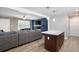 Open floor plan connecting a modern kitchen island to a comfortable living area at 4284 Carlos Ct, Powder Springs, GA 30127