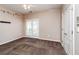 Bedroom with neutral walls, carpet, ceiling fan and sliding glass doors to outside at 432 Ira Sw St # 201, Atlanta, GA 30312