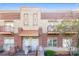Charming brick townhome with cozy balcony and well-maintained landscaping, offering an inviting curb appeal at 432 Ira Sw St # 201, Atlanta, GA 30312