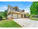 Charming home with a two-car garage and well-maintained landscaping on a lush lawn at 625 Aunt Lucy Sw Ln # 61, Smyrna, GA 30082