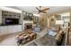 Comfortable living room with built-in shelving, a brick fireplace and cozy seating at 625 Aunt Lucy Sw Ln # 61, Smyrna, GA 30082