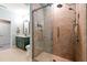 Tiled shower with glass door, handheld sprayer and convenient grab bar and seat at 625 Aunt Lucy Sw Ln # 61, Smyrna, GA 30082