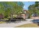 Spacious three car garage and long driveway add convenience to this brick two story home at 715 Aronson Lake Ct, Roswell, GA 30075