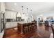 Well-equipped kitchen with stainless appliances, island seating, and open layout at 715 Aronson Lake Ct, Roswell, GA 30075