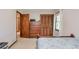 Bedroom featuring a bed, bureau, and closet at 1423 Fairfield Sw Dr, Lilburn, GA 30047