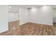 Large basement area with laminate flooring, neutral colors, recessed lighting, and versatile space at 160 Oglesby Bridge Rd, Conyers, GA 30094