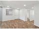 Spacious finished basement boasts recessed lighting, laminate flooring and neutral paint colors at 160 Oglesby Bridge Rd, Conyers, GA 30094
