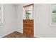 Small room featuring a wooden door with glass window and view of side yard at 160 Oglesby Bridge Rd, Conyers, GA 30094