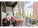 Cozy outdoor balcony area with comfortable seating, perfect for relaxing and enjoying the view at 1952 Maritime Way, Atlanta, GA 30318