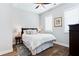 Cozy bedroom with hardwood floors, a ceiling fan, and neutral decor at 1952 Maritime Way, Atlanta, GA 30318
