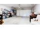 Spacious garage with overhead door and storage shelving at 1952 Maritime Way, Atlanta, GA 30318