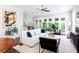 Inviting living room featuring hardwood floors, contemporary furnishings, and natural light at 1952 Maritime Way, Atlanta, GA 30318