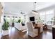 Bright and spacious open-concept living room featuring hardwood floors and abundant natural light at 1952 Maritime Way, Atlanta, GA 30318