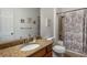 Bathroom featuring a granite-topped vanity and a shower-tub combination at 6865 Fletcher Dr, Winston, GA 30187