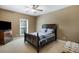 Cozy bedroom with a comfortable bed and a large window at 6865 Fletcher Dr, Winston, GA 30187