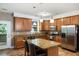 Well-equipped kitchen with granite countertops, stainless steel appliances, and ample cabinet space for storage at 6865 Fletcher Dr, Winston, GA 30187