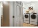 Spacious laundry room area with included washer and dryer, and plenty of space at 6865 Fletcher Dr, Winston, GA 30187