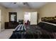 Main bedroom with a walk-in closet and neutral carpet at 6865 Fletcher Dr, Winston, GA 30187