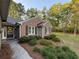 Charming brick and siding home with well-maintained landscaping and inviting entryway at 2380 Emerald Dr, Loganville, GA 30052