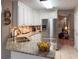 Kitchen featuring granite countertops, stainless steel appliances and tile floors at 2380 Emerald Dr, Loganville, GA 30052