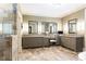 Large bathroom featuring a walk-in shower and separate vanities with ample counter space at 5178 S Trimble Rd, Atlanta, GA 30342