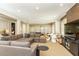 Spacious living room provides a relaxing retreat with comfortable sofa, foosball table, and entertainment area at 5178 S Trimble Rd, Atlanta, GA 30342