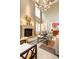 Bright living room with a fireplace, soaring ceilings, and elegant decor at 5178 S Trimble Rd, Atlanta, GA 30342
