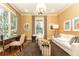 Cozy home office with large windows, custom desk, and comfortable seating at 5178 S Trimble Rd, Atlanta, GA 30342