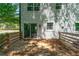 An outdoor wooden deck with a railing, offering a space for relaxation and enjoying the surrounding views at 5180 Stone Trce, Stone Mountain, GA 30083