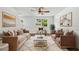 Bright living room featuring stylish furnishings, a ceiling fan, and ample natural light at 5180 Stone Trce, Stone Mountain, GA 30083