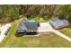 Aerial view of the home, outbuilding, and pool at 127 Pebblebrook Way, Temple, GA 30179