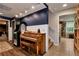 Finished basement features a piano, arcade game, and access to other rooms at 1485 Mill Place Dr, Dacula, GA 30019