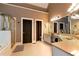 Bright bathroom featuring double vanity, walk-in shower and separate toilet area at 1485 Mill Place Dr, Dacula, GA 30019