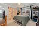 Bright bedroom with a window, desk, and closet at 1485 Mill Place Dr, Dacula, GA 30019