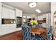 Breakfast nook with white cabinets and stainless steel appliances at 1485 Mill Place Dr, Dacula, GA 30019