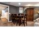 Inviting dining area with a wooden table set and custom cabinet, perfect for Gathering meals and entertaining at 1485 Mill Place Dr, Dacula, GA 30019