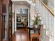Open foyer features hardwood floors, staircase, and glimpses into other rooms, creating a welcoming atmosphere at 1485 Mill Place Dr, Dacula, GA 30019